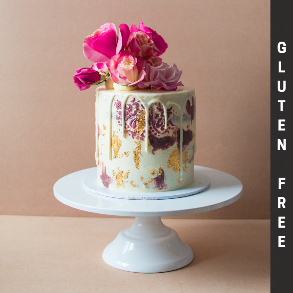 Gluten Free Vintage Cake with flowers and white chocolate drip