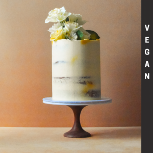 Vegan classic cake with white flowers