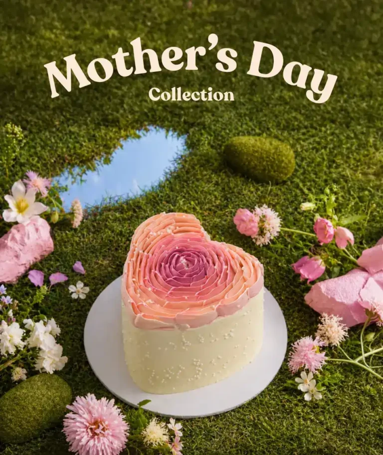 Mother's Day Cake in a green field with pink flowers