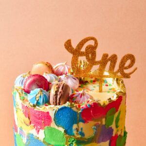 Close up image of colourful cake with one cake topper